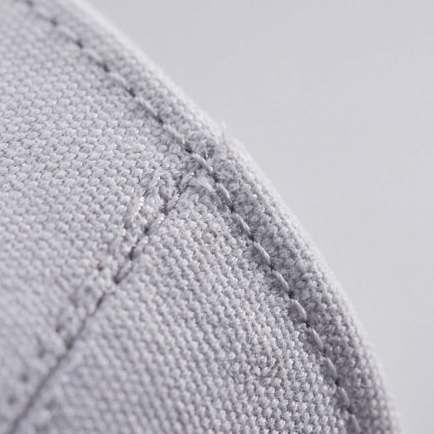 A stitched panel edge on the premium cotton canvas used on Volt.