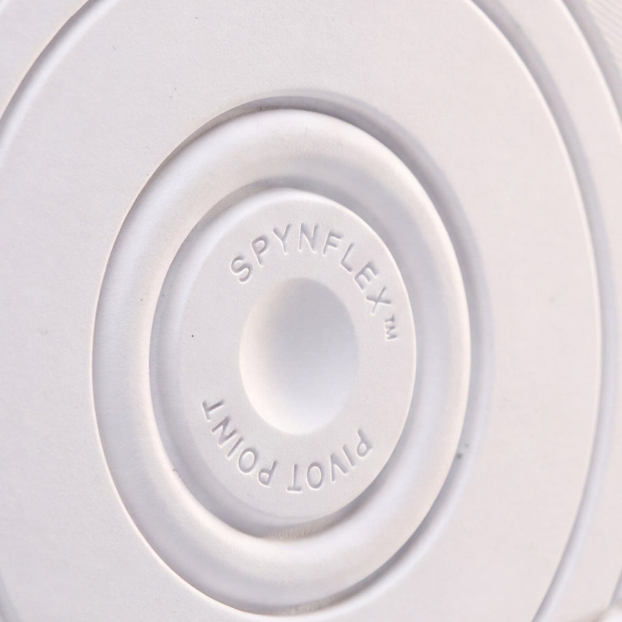 The SPYNFLEX® pivot point in close-up, showing the moulded mark and the rings around it.